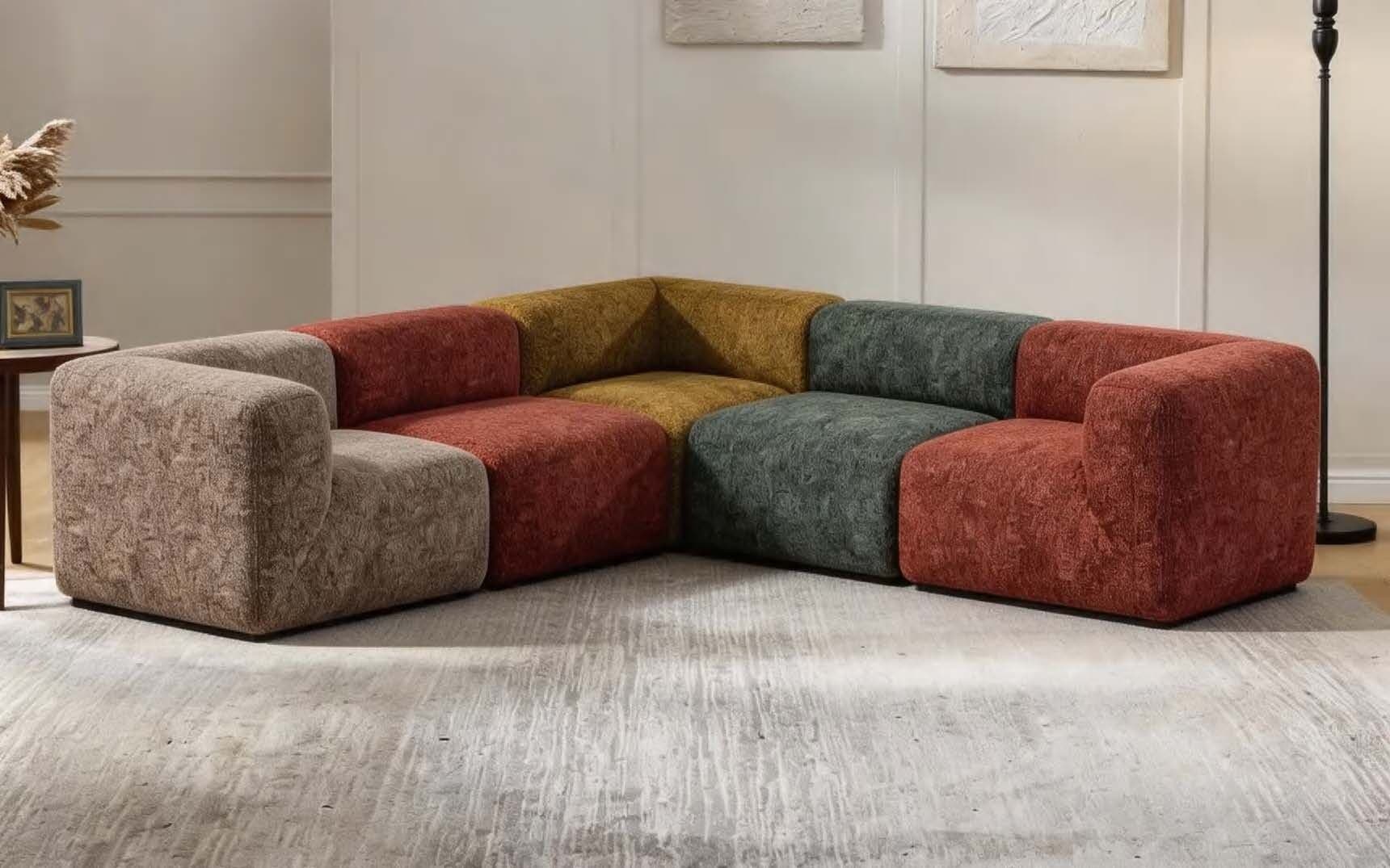 A colourful modular sectional sofa in a warm, sunlit living room