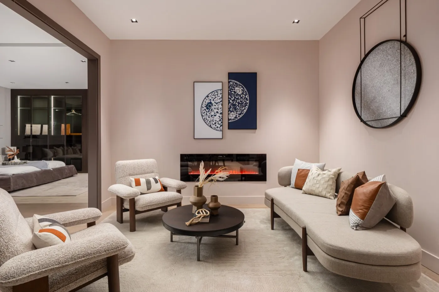 Blush living room vignette with fireplace
